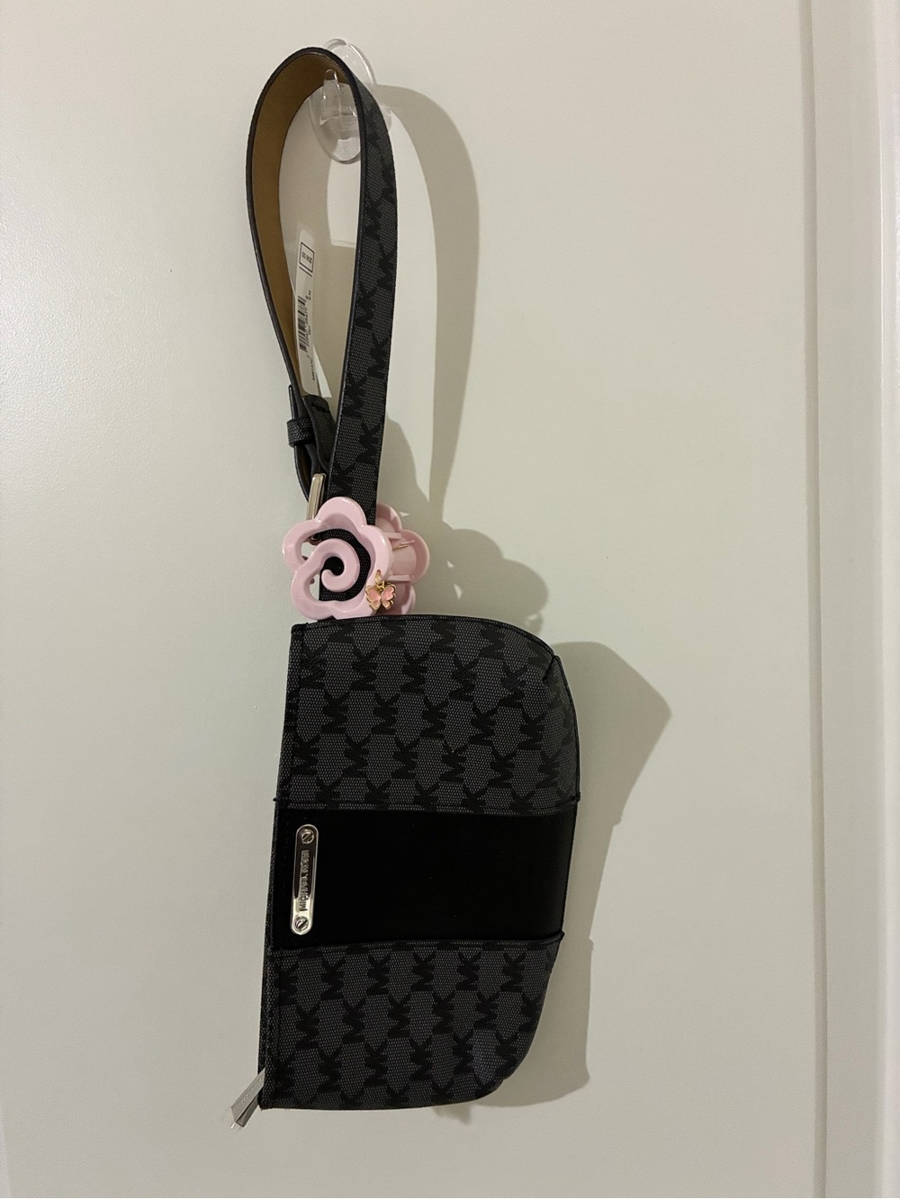 Michael Kors Black Patterned Crossbody Wristlet with Pink Flower Charm